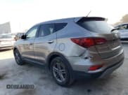 ✅ 2018 Hyundai Santa Fe 2.4L • VIN: 5NMZT3LB6JH095209 • Лот: 66211623. Опубликован ранее на Copart с пробегом 57 947 миль. Бесплатный доступ к архиву аукционных продаж из США и подробный отчёт об истории автомобиля на DreamBid. Изображение 2.