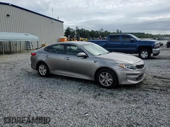 ✅ 2018 Kia Optima LX • VIN: 5XXGT4L30JG213498 • Lot: 83987565. Listed on Copart with 96,457 mi. Free auction sales archive from the USA and detailed vehicle history report at DreamBid. Image 13.