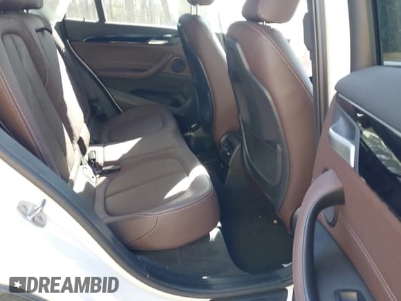 ✅ 2022 BMW X1 xDrive28i • VIN: WBXJG9C04N5V16794 • Lot: 41667535. Listed on IAAI with 55,747 mi. Free auction sales archive from the USA and detailed vehicle history report at DreamBid. Image 8.