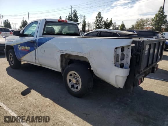 ✅ 2015 Chevrolet Silverado 1500 LS • VIN: 1GCNCPEH7FZ350072 • Лот: 79101174. Опубликован ранее на Copart с пробегом 128 503 миль. Бесплатный доступ к архиву аукционных продаж из США и подробный отчёт об истории автомобиля на DreamBid. Изображение 2.