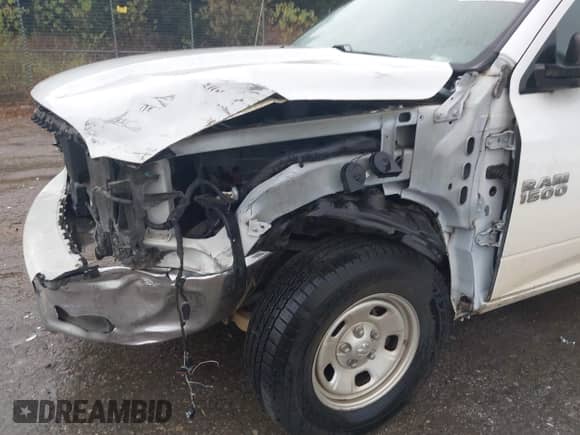 2016 Ram 1500 Tradesman z VIN 3C6JR6DT8GG257406, wystawiony jako IAAI lot #43430639 z przebiegiem 88 663 mil mil oraz . Historia ofert i sprzedaży dostępna na DreamBid. Obrazek 6.