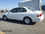 ✅ 2005 Kia Optima LX • VIN: KNAGD126155389037 • Lot: 81331355. Listed on Copart with 98,208 mi. Free auction sales archive from the USA and detailed vehicle history report at DreamBid. Image 2.