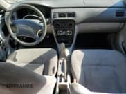 ✅ 2002 Chevrolet Prizm • VIN: 1Y1SK52842Z408689 • Lot: 80474435. Listed on Copart with 297,701 mi. Free auction sales archive from the USA and detailed vehicle history report at DreamBid. Image 8.