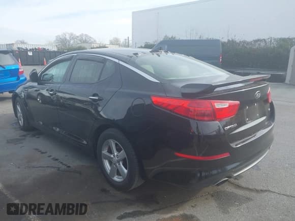 ✅ 2015 Kia Optima LX • VIN: 5XXGM4A70FG518087 • Lot: 43857571. Listed on IAAI with 166,641 mi. Free auction sales archive from the USA and detailed vehicle history report at DreamBid. Image 3.