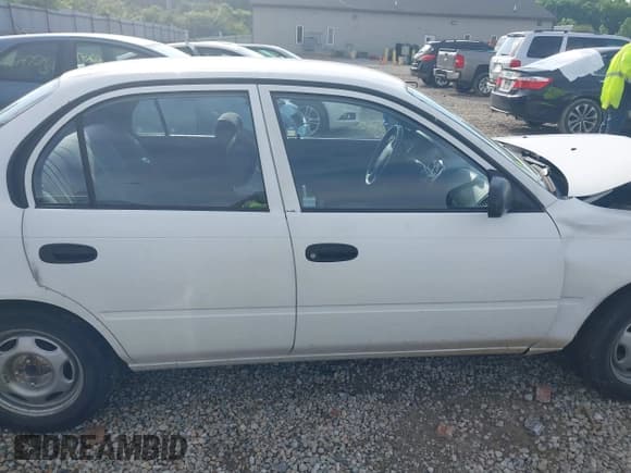 ✅ 1996 Toyota Corolla • VIN: 1NXBA02E7TZ480447 • Lot: 42257057. Listed on IAAI with 161,651 mi. Free auction sales archive from the USA and detailed vehicle history report at DreamBid. Image 12.