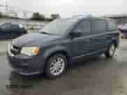 2014 Dodge Grand Caravan SXT с VIN 2C4RDGCG1ER344723, выставлен на аукционе Copart как лот 85332765 с пробегом 145 921 миль миль и Списание • Salvage title. История ставок и продаж доступна на DreamBid. Изображение 1.