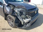 ✅ 2021 Honda Passport EX-L • VIN: 5FNYF8H51MB027490 • Lot: 42527501. Listed on IAAI with 85,635 mi. Free auction sales archive from the USA and detailed vehicle history report at DreamBid. Image 6.