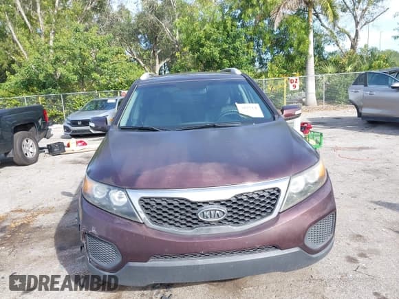 ✅ 2013 Kia Sorento LX • VIN: 5XYKTDA20DG397748 • Lot: 43802514. Listed on IAAI with 144,489 mi. Free auction sales archive from the USA and detailed vehicle history report at DreamBid. Image 12.