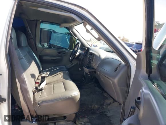 ✅ 2003 Ford F-150 XL • VIN: 2FTPX17Z63CA02885 • Лот: 41782773. Опубликован ранее на IAAI с пробегом 184 306 миль. Бесплатный доступ к архиву аукционных продаж из США и подробный отчёт об истории автомобиля на DreamBid. Изображение 5.