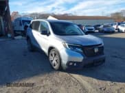 ✅ 2021 Honda Passport EX-L • VIN: 5FNYF8H51MB014349 • Lot: 43733895. Listed on IAAI with 36,679 mi. Free auction sales archive from the USA and detailed vehicle history report at DreamBid. Image 1.