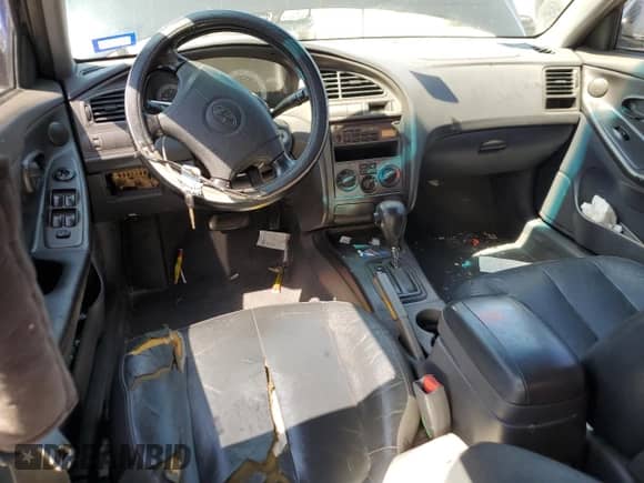 2003 Hyundai Elantra GLS z VIN KMHDN45D43U509474, wystawiony jako Copart lot #71657564 z przebiegiem 346 936 mil mil oraz Szkoda całkowita • Salvage title. Historia ofert i sprzedaży dostępna na DreamBid. Obrazek 8.