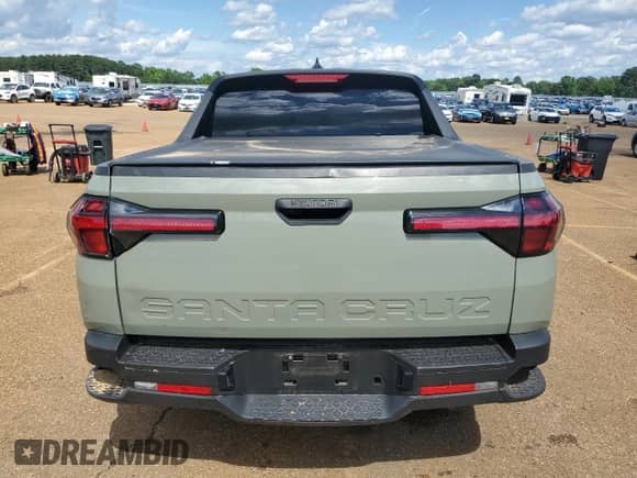 2023 Hyundai Santa Cruz SE with VIN 5NTJA4AE7PH069415, listed as a Copart auction lot 56434945 with 43,866 mi miles and Salvage title. Bid and sale history available at DreamBid. Image 6.