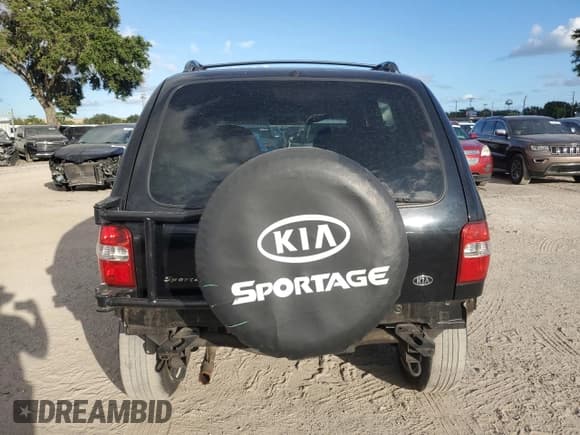 ✅ 2002 Kia Sportage • VIN: KNDJB723625167905 • Lot: 74193854. Listed on Copart with 98,864 mi. Free auction sales archive from the USA and detailed vehicle history report at DreamBid. Image 6.