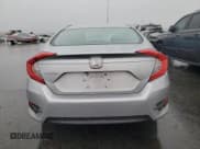 ✅ 2018 Honda Civic LX • VIN: 2HGFC2F50JH538020 • Лот: 93047235. Опубликован ранее на Copart с пробегом 83 134 миль. Бесплатный доступ к архиву аукционных продаж из США и подробный отчёт об истории автомобиля на DreamBid. Изображение 6.