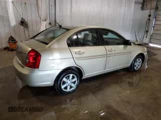 2007 Hyundai Accent GLS with VIN KMHCN46C87U103169, listed as a Copart auction lot 70390484 with 129,702 mi miles and Salvage title. Bid and sale history available at DreamBid. Image 3.