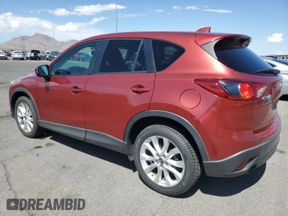 ✅ 2013 Mazda CX-5 Grand Touring • VIN: JM3KE2DE3D0154498 • Lot: 70603435. Wystawiony na Copart z przebiegiem 121 633 mil. Bezpłatny archiwum sprzedaży aukcyjnych z USA i szczegółowy raport historii pojazdu na DreamBid. Zdjęcie 2.