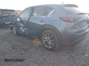 ✅ 2019 Mazda CX-5 Grand Touring Reserve • VIN: JM3KFBDYXK0568219 • Lot: 43619359. Listed on IAAI with 65,252 mi. Free auction sales archive from the USA and detailed vehicle history report at DreamBid. Image 3.