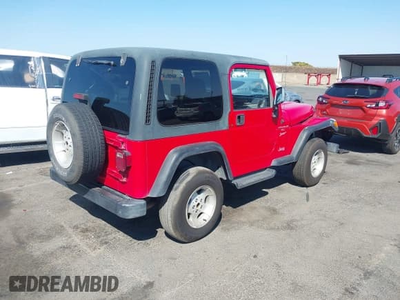 ✅ 1999 Jeep Wrangler Sport • VIN: 1J4FY19S2XP489428 • Лот: 43210167. Опубликован ранее на IAAI с пробегом 185 950 миль. Бесплатный доступ к архиву аукционных продаж из США и подробный отчёт об истории автомобиля на DreamBid. Изображение 4.