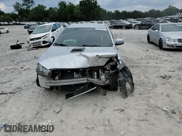 ✅ 2014 Mitsubishi Lancer SE • VIN: JA32V2FW9EU010123 • Lot: 68004345. Listed on Copart with 143,595 mi. Free auction sales archive from the USA and detailed vehicle history report at DreamBid. Image 14.