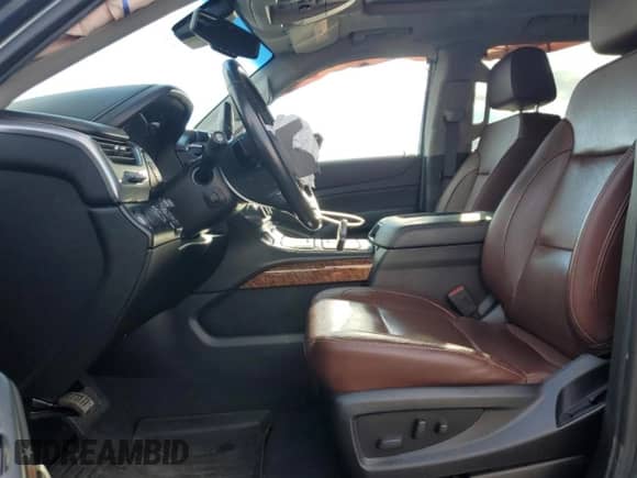 2020 Chevrolet Tahoe Premier with VIN 1GNSKCKJ0LR101198, listed as a Copart auction lot 84955895 with 99,414 mi miles and Salvage title. Bid and sale history available at DreamBid. Image 7.