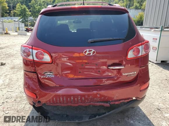 2011 Hyundai Santa Fe Limited с VIN 5XYZKDAG7BG064084, выставлен на аукционе Copart как лот 70747044 с пробегом 105 053 миль миль и Списание • Salvage title. История ставок и продаж доступна на DreamBid. Изображение 6.