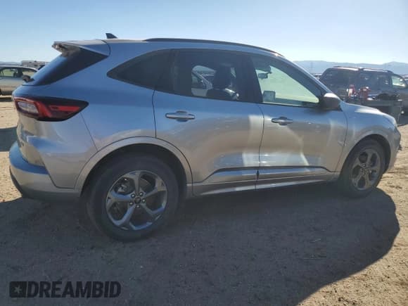 ✅ 2023 Ford Escape ST-Line • VIN: 1FMCU0MZ2PUB14476 • Лот: 86555395. Опубликован ранее на Copart с пробегом 13 540 миль. Бесплатный доступ к архиву аукционных продаж из США и подробный отчёт об истории автомобиля на DreamBid. Изображение 3.