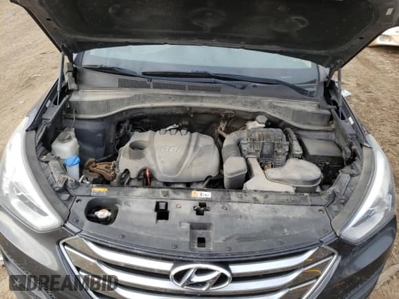 ✅ 2015 Hyundai Santa Fe • VIN: 5XYZTDLB2FG285774 • Лот: 69498402. Опубликован ранее на Copart с пробегом Не указан. Бесплатный доступ к архиву аукционных продаж из США и подробный отчёт об истории автомобиля на DreamBid. Изображение 12.