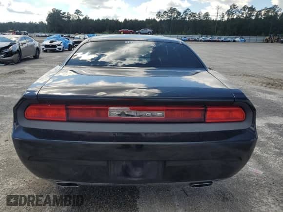 2013 Dodge Challenger SXT z VIN 2C3CDYAG5DH736384, wystawiony jako Copart lot #86122405 z przebiegiem Nie podano mil oraz Szkoda całkowita • Salvage title. Historia ofert i sprzedaży dostępna na DreamBid. Obrazek 6.