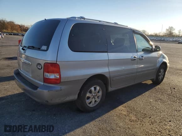 ✅ 2005 Kia Sedona LX • VIN: KNDUP132356759018 • Lot: 91089245. Listed on Copart with 241,426 mi. Free auction sales archive from the USA and detailed vehicle history report at DreamBid. Image 3.