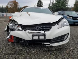✅ 2011 Hyundai Genesis Coupe Track • VIN: KMHHU6KH3BU057927 • Lot: 90633495. Wystawiony na Copart z przebiegiem 107 214 mil. Bezpłatny archiwum sprzedaży aukcyjnych z USA i szczegółowy raport historii pojazdu na DreamBid. Zdjęcie 5.