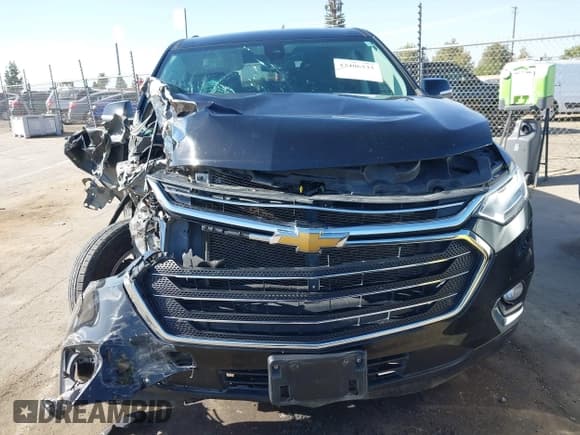 ✅ 2021 Chevrolet Traverse LT Cloth • VIN: 1GNERGKW7MJ236528 • Lot: 43406533. Wystawiony na IAAI z przebiegiem 59 484 mil. Bezpłatny archiwum sprzedaży aukcyjnych z USA i szczegółowy raport historii pojazdu na DreamBid. Zdjęcie 13.
