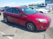 ✅ 2014 Ford Focus Titanium • VIN: 1FADP3N24EL158443 • Lot: 42801477. Listed on IAAI with 116,859 mi. Free auction sales archive from the USA and detailed vehicle history report at DreamBid. Image 1.