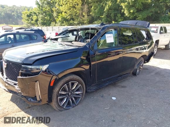 ✅ 2023 Cadillac Escalade 4WD Sport • VIN: 1GYS4EKL1PR484665 • Лот: 42658662. Опубликован ранее на IAAI с пробегом 45 772 миль. Бесплатный доступ к архиву аукционных продаж из США и подробный отчёт об истории автомобиля на DreamBid. Изображение 2.