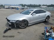 ✅ 2015 Audi RS 7 • VIN: WAUW2CFC5FN013049 • Lot: 57957093. Wystawiony na Copart z przebiegiem 95 826 mil. Bezpłatny archiwum sprzedaży aukcyjnych z USA i szczegółowy raport historii pojazdu na DreamBid. Zdjęcie 1.