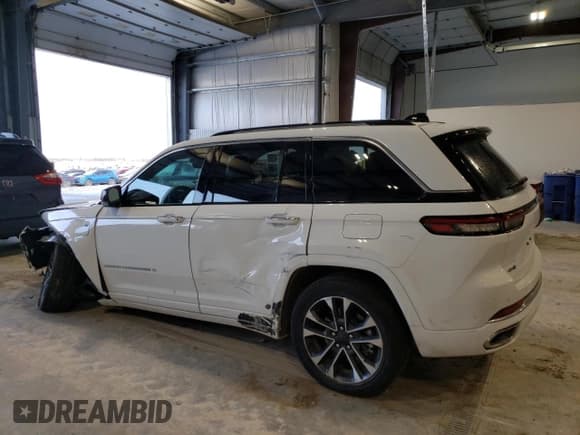 ✅ 2022 Jeep Grand Cherokee Overland • VIN: 1C4RJYD68N8716557 • Lot: 86807614. Listed on Copart with 12,590 mi. Free auction sales archive from the USA and detailed vehicle history report at DreamBid. Image 2.