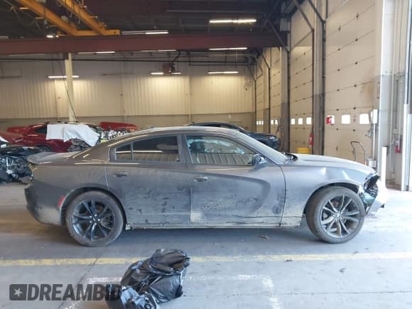 ✅ 2018 Dodge Charger SXT Plus • VIN: 2C3CDXHG3JH273978 • Lot: 42460672. Listed on IAAI with 83,450 mi. Free auction sales archive from the USA and detailed vehicle history report at DreamBid. Image 13.