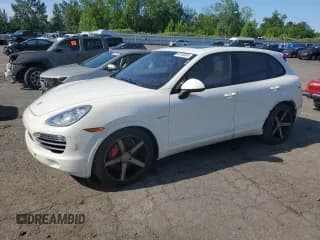 ✅ 2012 Porsche Cayenne S Hybrid • VIN: WP1AE2A25CLA90443 • Лот: 60108595. Опубликован ранее на Copart с пробегом 141 595 миль. Бесплатный доступ к архиву аукционных продаж из США и подробный отчёт об истории автомобиля на DreamBid. Изображение 1.