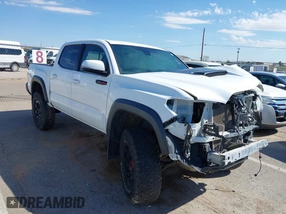 ✅ 2019 Toyota Tacoma TRD Off Road • VIN: 5TFCZ5AN8KX174385 • Lot: 43377594. Listed on IAAI with 123,475 mi. Free auction sales archive from the USA and detailed vehicle history report at DreamBid. Image 1.