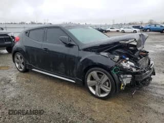 ✅ 2015 Hyundai Veloster Turbo • VIN: KMHTC6AE8FU235003 • Lot: 84561424. Wystawiony na Copart z przebiegiem 123 042 mil. Bezpłatny archiwum sprzedaży aukcyjnych z USA i szczegółowy raport historii pojazdu na DreamBid. Zdjęcie 4.