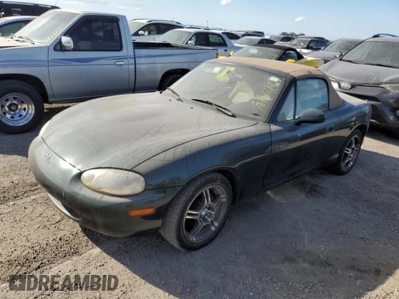 ✅ 1999 Mazda MX-5 Miata • VIN: JM1NB3536X0112039 • Lot: 76167214. Wystawiony na Copart z przebiegiem Nie podano. Bezpłatny archiwum sprzedaży aukcyjnych z USA i szczegółowy raport historii pojazdu na DreamBid. Zdjęcie 1.