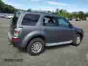 2010 Mercury Mariner Premier с VIN 4M2CN9HG3AKJ25661, выставлен на аукционе Copart как лот 69384945 с пробегом 154 199 миль миль и Списание • Salvage title. История ставок и продаж доступна на DreamBid. Изображение 3.