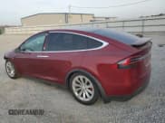 ✅ 2016 Tesla Model X P90D • VIN: 5YJXCBE46GFS00261 • Lot: 93614055. Listed on Copart with 134,703 mi. Free auction sales archive from the USA and detailed vehicle history report at DreamBid. Image 2.