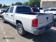 ✅ 2005 Dodge Dakota ST • VIN: 1D7HE28N45S218668 • Lot: 42276061. Wystawiony na IAAI z przebiegiem 141 724 mil. Bezpłatny archiwum sprzedaży aukcyjnych z USA i szczegółowy raport historii pojazdu na DreamBid. Zdjęcie 3.