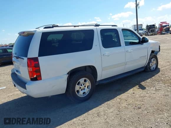 2014 Chevrolet Suburban LT z VIN 1GNSCJE0XER245963, wystawiony jako IAAI lot #43110230 z przebiegiem 160 648 mil mil oraz . Historia ofert i sprzedaży dostępna na DreamBid. Obrazek 4.