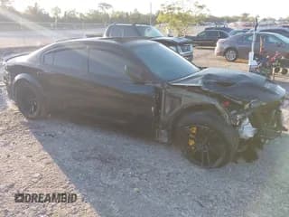 ✅ 2022 Dodge Charger SRT Hellcat Widebody • VIN: 2C3CDXL97NH121510 • Lot: 43478561. Wystawiony na IAAI z przebiegiem 42 368 mil. Bezpłatny archiwum sprzedaży aukcyjnych z USA i szczegółowy raport historii pojazdu na DreamBid. Zdjęcie 1.