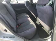 ✅ 2002 Mazda Protege DX • VIN: JM1BJ225721584923 • Лот: 82630595. Опубликован ранее на Copart с пробегом 179 288 миль. Бесплатный доступ к архиву аукционных продаж из США и подробный отчёт об истории автомобиля на DreamBid. Изображение 10.