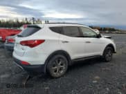 ✅ 2014 Hyundai Santa Fe • VIN: 5XYZUDLB8EG159107 • Lot: 89474465. Listed on Copart with 135,472 mi. Free auction sales archive from the USA and detailed vehicle history report at DreamBid. Image 3.