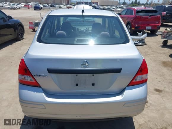 ✅ 2010 Nissan Versa 1.6 Base • VIN: 3N1CC1AP4AL393725 • Lot: 42529272. Listed on IAAI with 245,226 mi. Free auction sales archive from the USA and detailed vehicle history report at DreamBid. Image 17.
