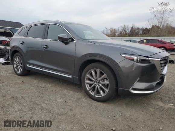 ✅ 2021 Mazda CX-9 Grand Touring • VIN: JM3TCBDYXM0537522 • Lot: 91163475. Listed on Copart with 123,456 mi. Free auction sales archive from the USA and detailed vehicle history report at DreamBid. Image 4.