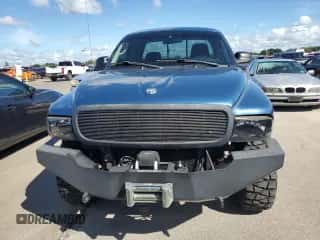 2003 Dodge Dakota z VIN 1D7HG12X93S267179, wystawiony jako Copart lot #74291174 z przebiegiem Nie podano mil oraz Nie do naprawy • Non repairable. Historia ofert i sprzedaży dostępna na DreamBid. Obrazek 5.